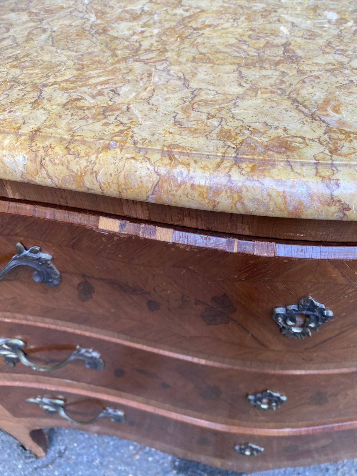 Curved Louis XV chest of drawers in marquetry and beige marble