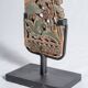 Indonesian construction element in carved wood with intertwined plant motifs mounted on a base (fri