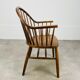 Baumann armchair with Scandinavian style bars, desk