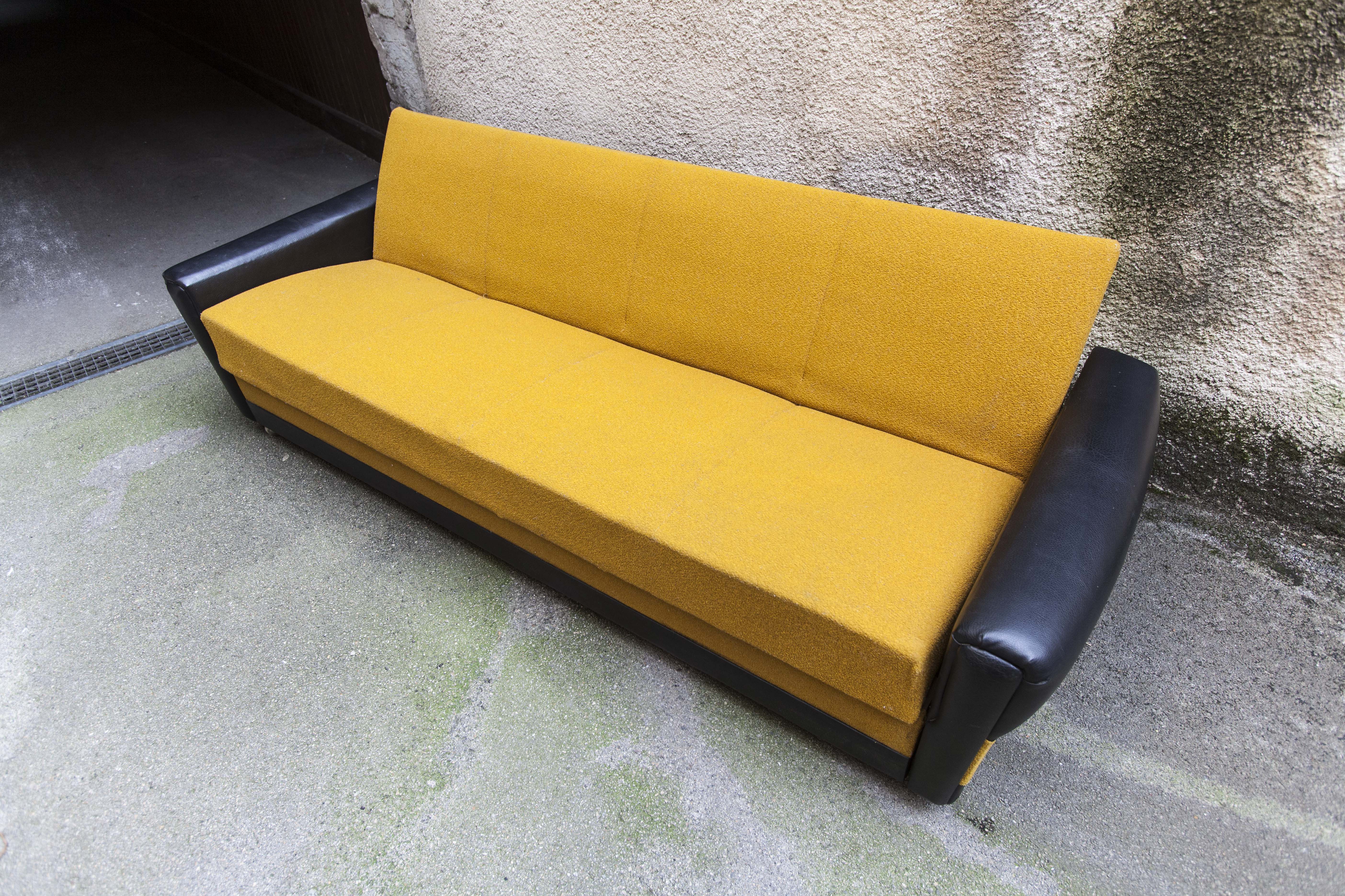 The 1970s gold and black Daybed couch