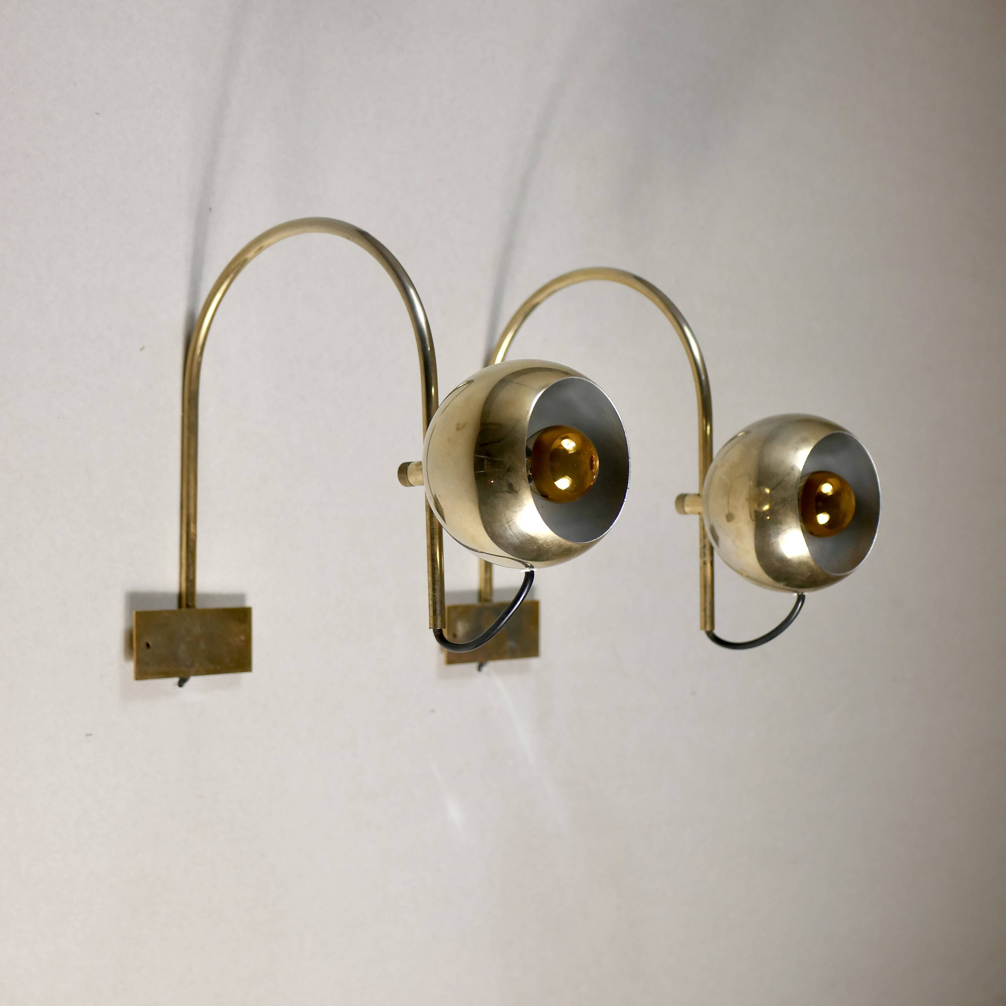 Pair of brass eyeball wall lights