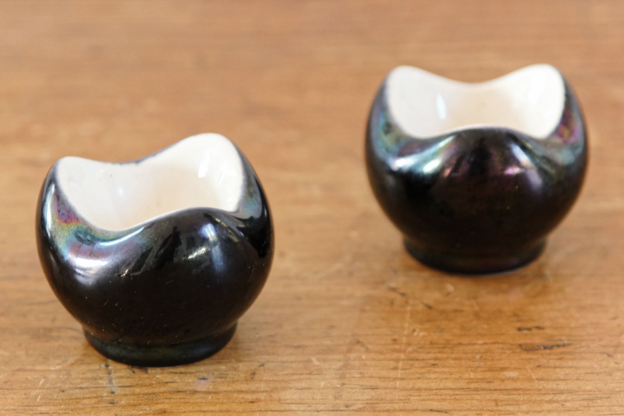 Lot of iridescent earthenware salerons