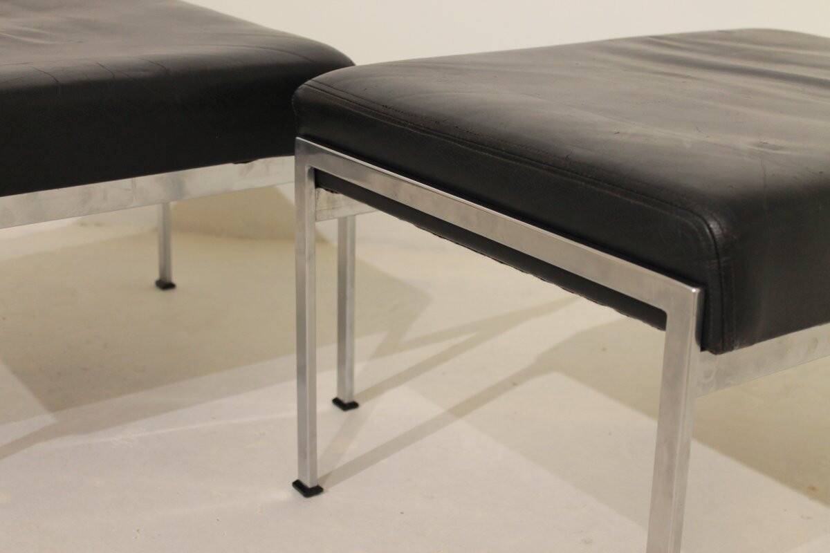 Pair of designer leather and brushed stainless steel footrests - Rob Parry