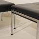 Pair of designer leather and brushed stainless steel footrests - Rob Parry