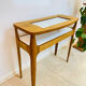 Small contemporary console in stained walnut wood.