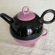 Selfish teapot and its cup