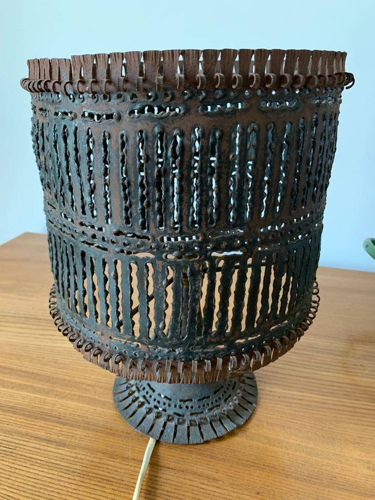 Openwork metal lamp