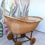 Wicker cradle on wheels