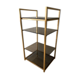 Golden brass and glass shelves