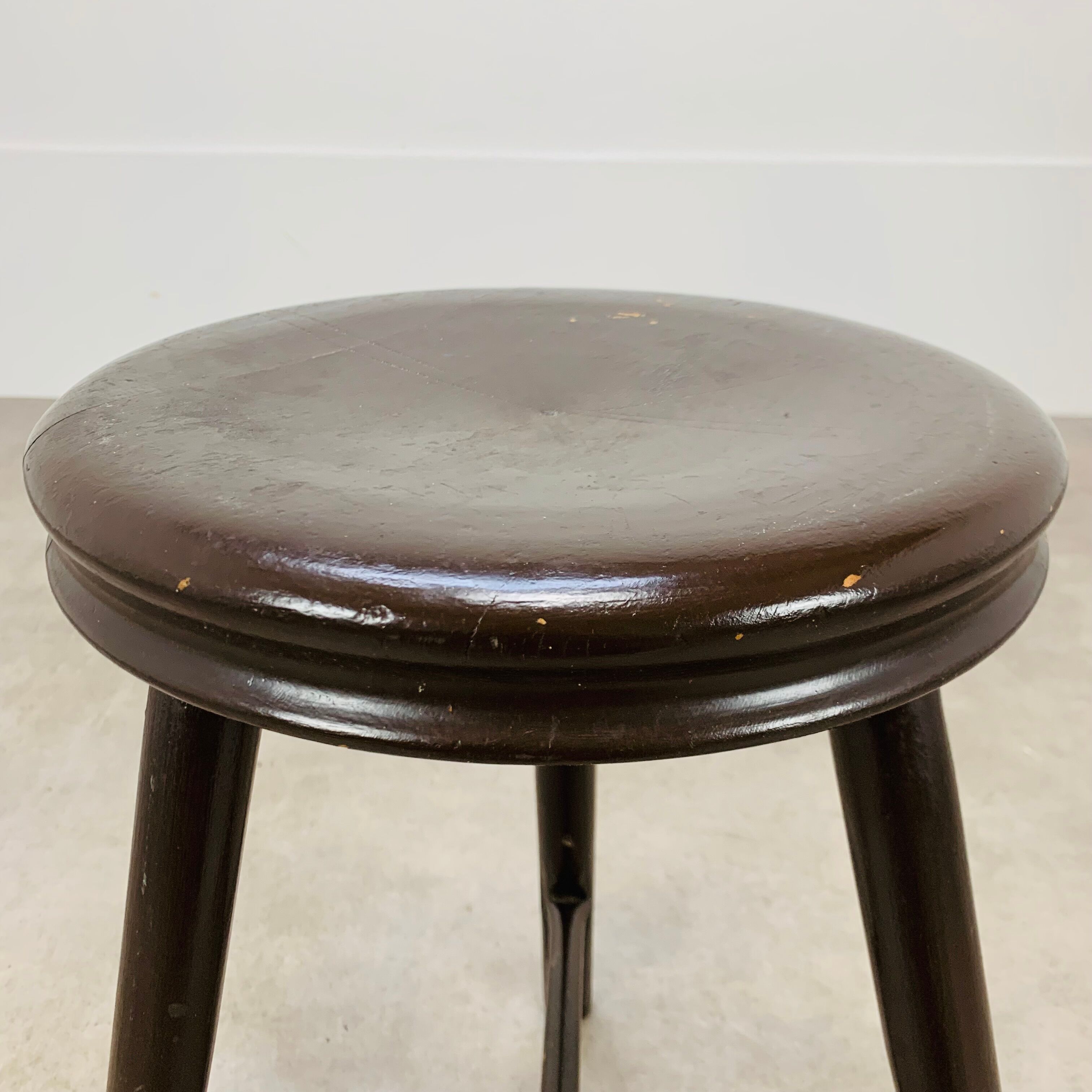 Industrial metal and wood tripod stool