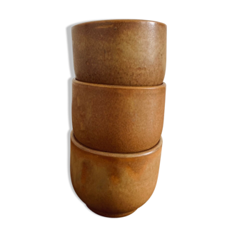 Three sandstone cups without handles