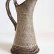 Enamelled stoneware pitcher signed