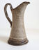 Enamelled stoneware pitcher signed