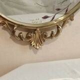 Gilded bronze mirror and screen-printed glass with flower motif