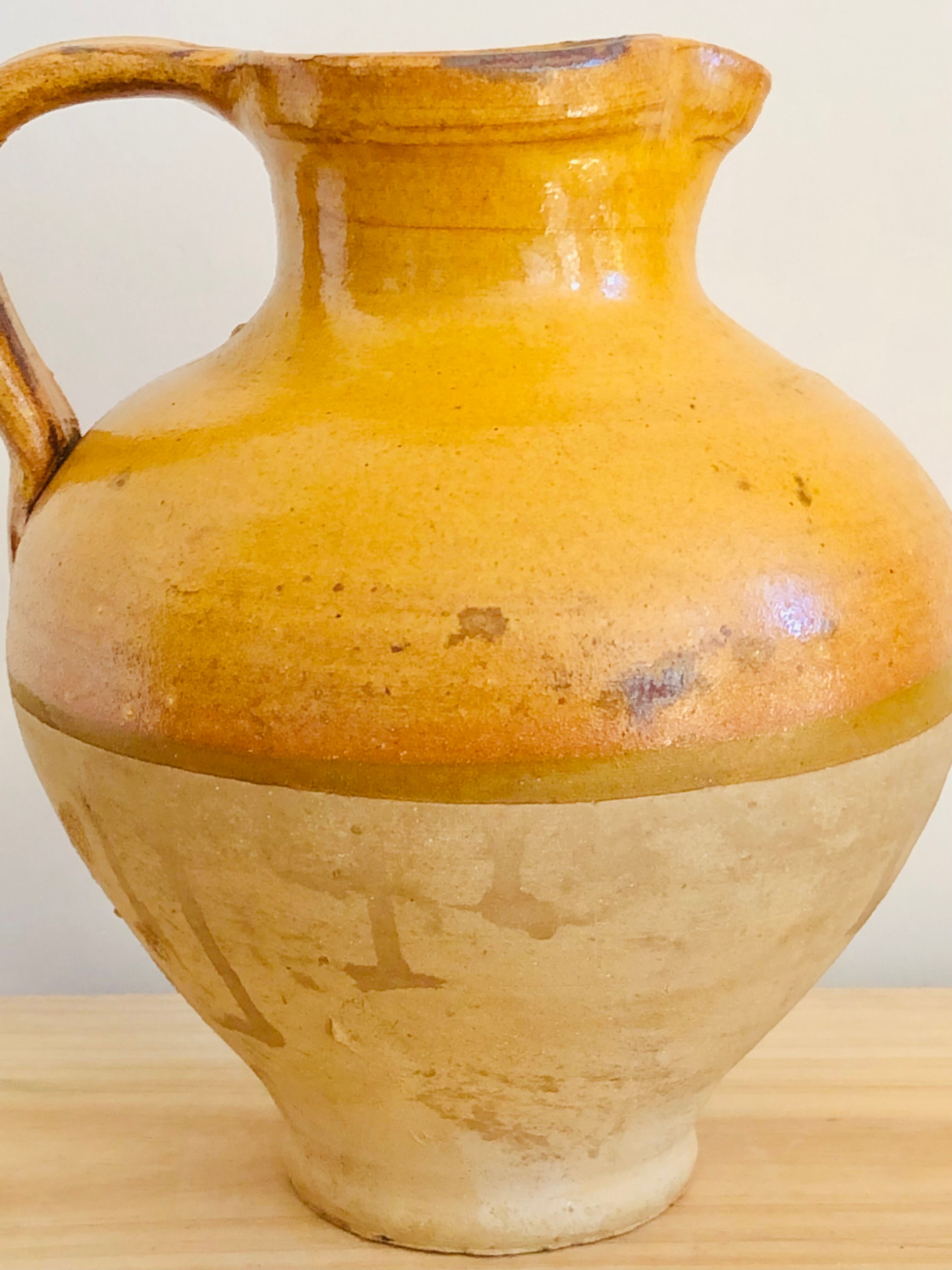 Vintage jug in glazed earth