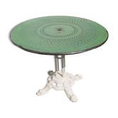Garden table made of sheet metal and cast iron legs