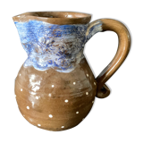 Brown enamelled ceramic pitcher with polka dots