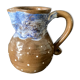 Brown enamelled ceramic pitcher with polka dots