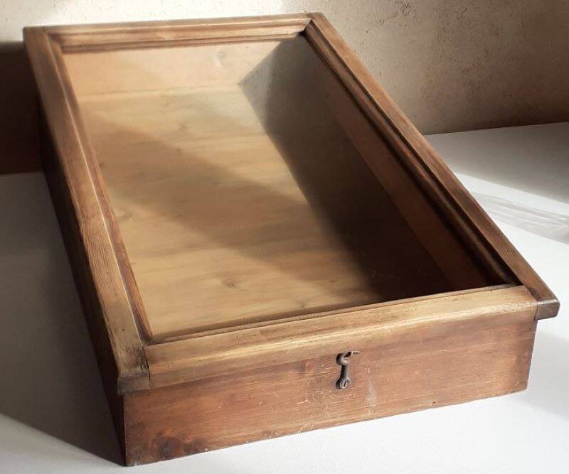 Old sloping pine display case