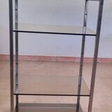 Artelano design shelving unit in steel and smoked glass, the smoked glass shelves are adjustable