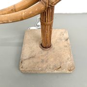 Sculptural floor lamp in bent rattan