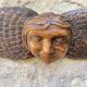 Carved wooden angel head