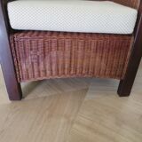 Vintage colonial-style armchair in woven rattan and exotic wood