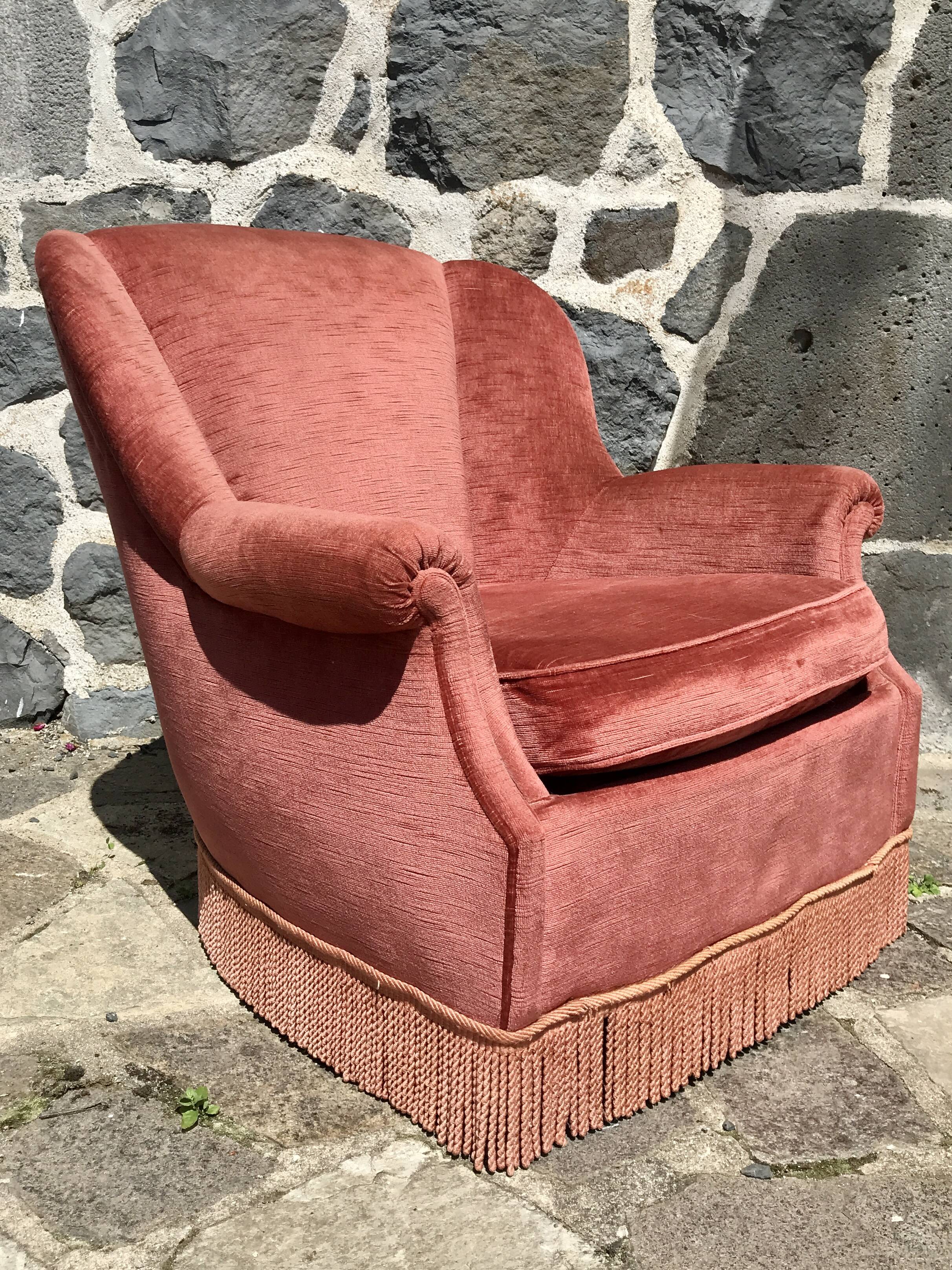 Vintage pink velvet armchair with fringes