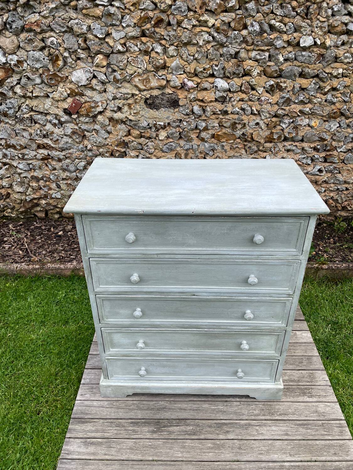 Vintage chest of drawers with white patina