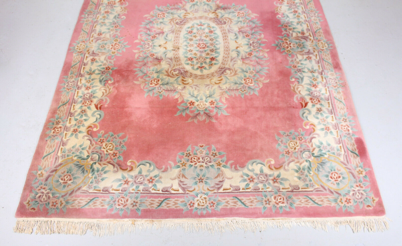 Chinese fringed wool rug with floral pattern on pink background 388x275cm