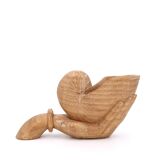 Wooden hand emptier holding a shell, 1970s