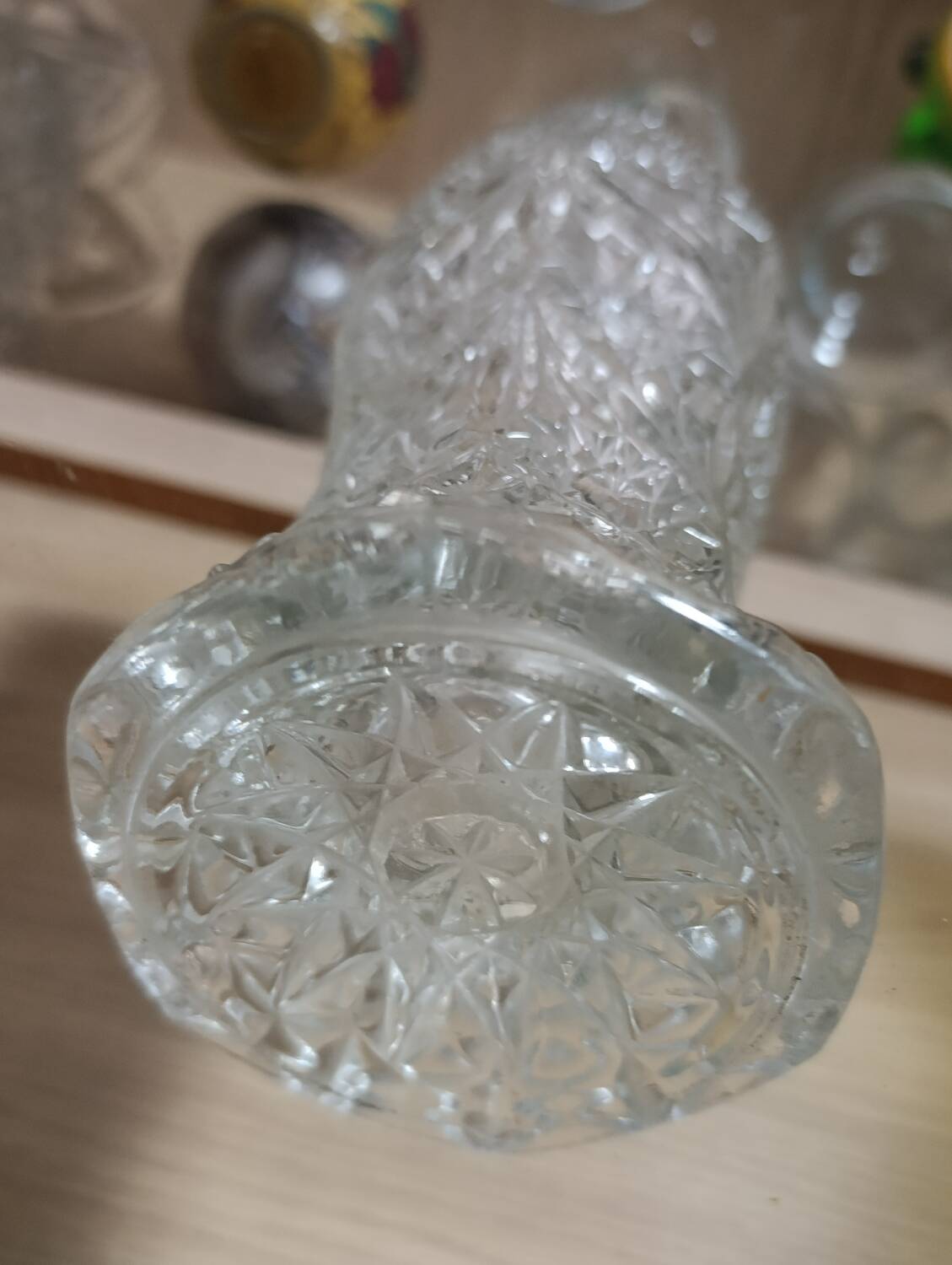 Vintage pressed glass vase, a decorative and elegant piece.