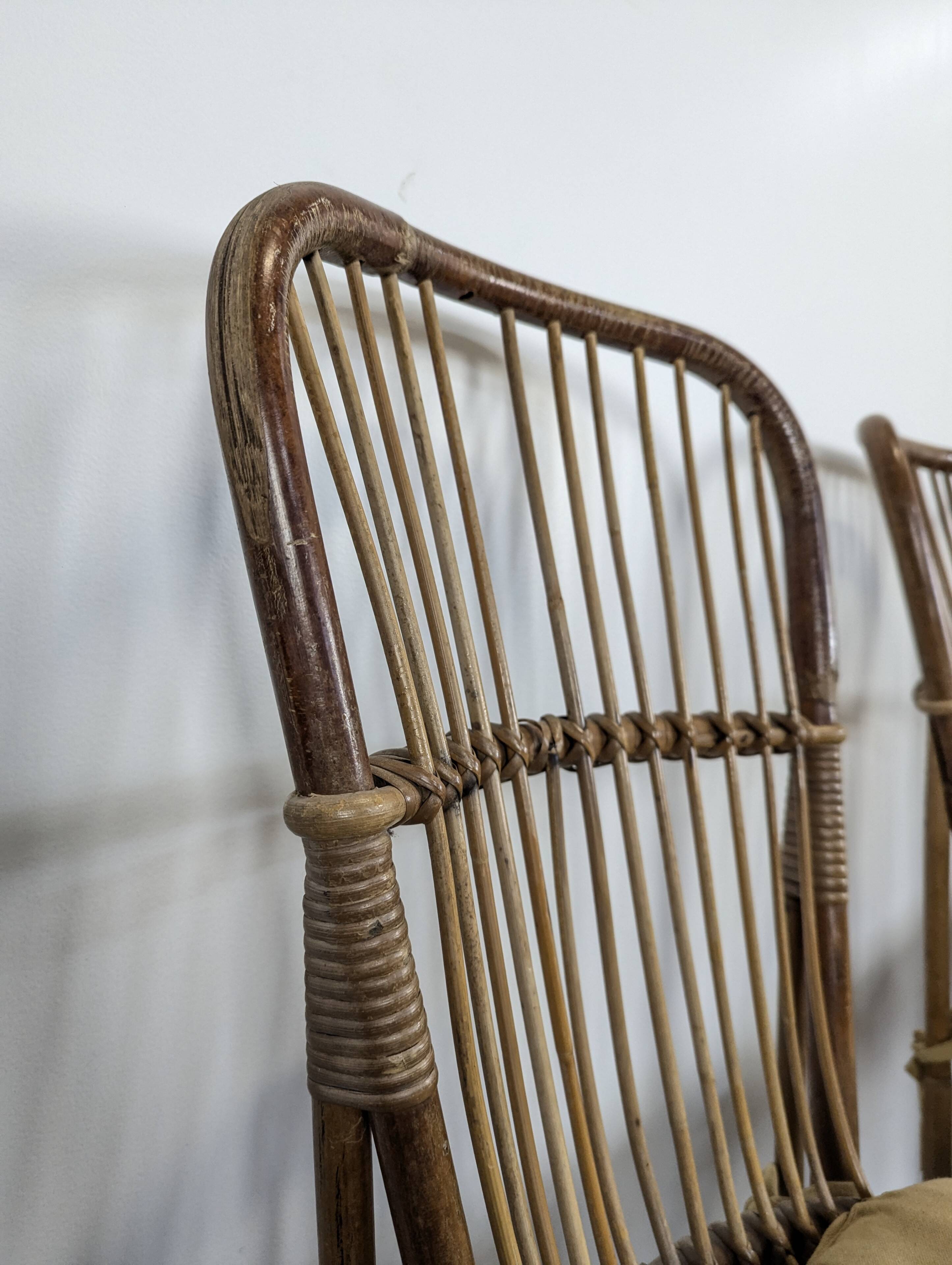 Set of 3 chairs and a rattan armchair.