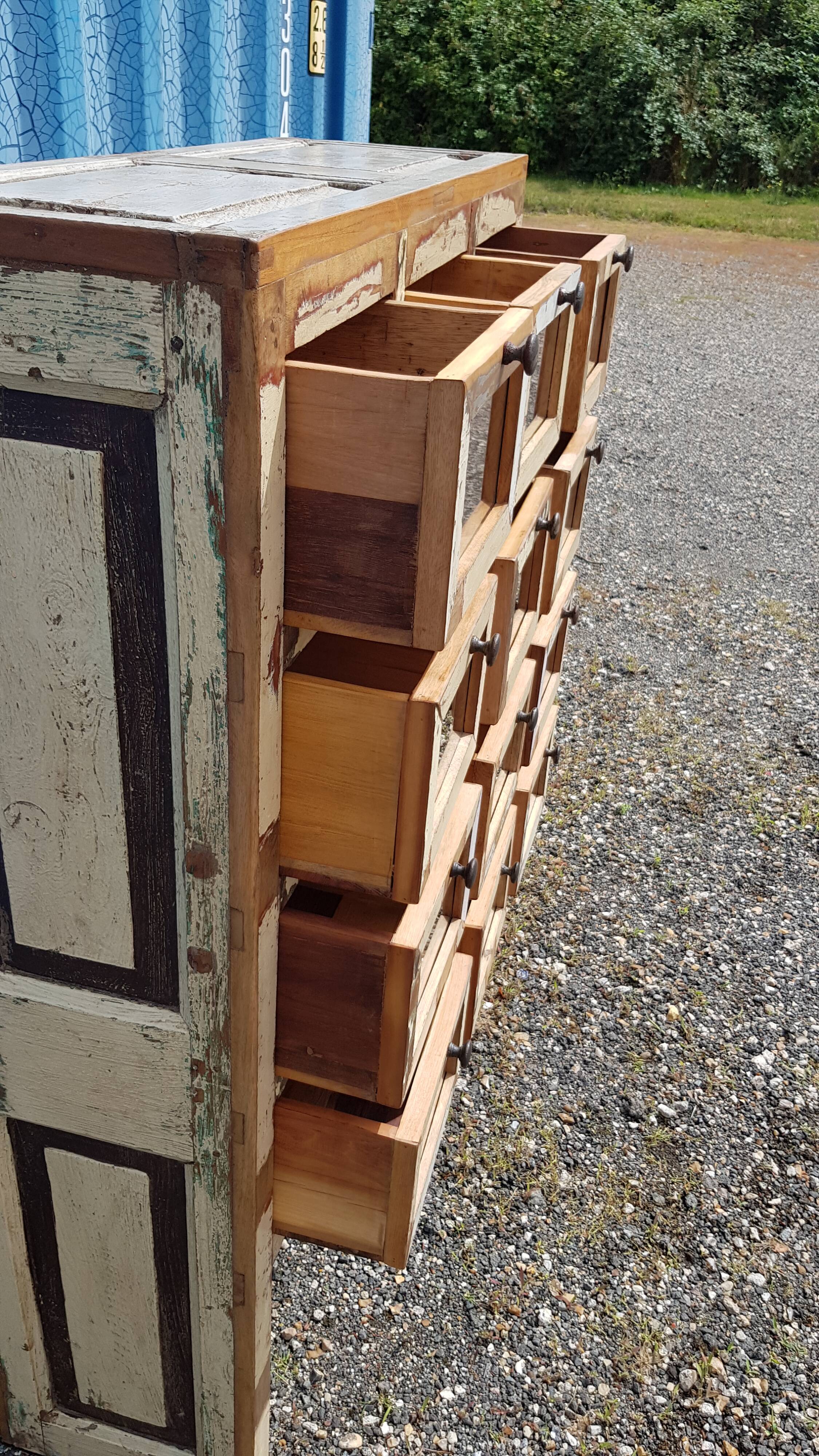 Merchant furniture - chest of drawers with 12 teak drawers