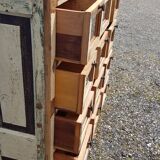 Meuble de marchand - chiffonnier 12 tiroirs en teck
