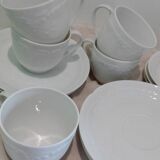 Set of 9 white porcelain coffee cups