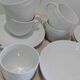 Set of 9 white porcelain coffee cups