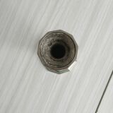 single flower vase or metal candlestick