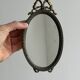 Petit miroir oval ancien