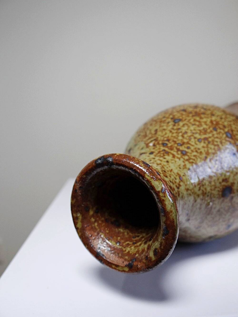 Tall bottle or soliflore in vintage handcrafted enamelled pyrite stoneware from the 60s and 70s