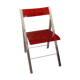 Red Plexiglas folding chair