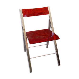 Chaise pliante en plexiglas rouge
