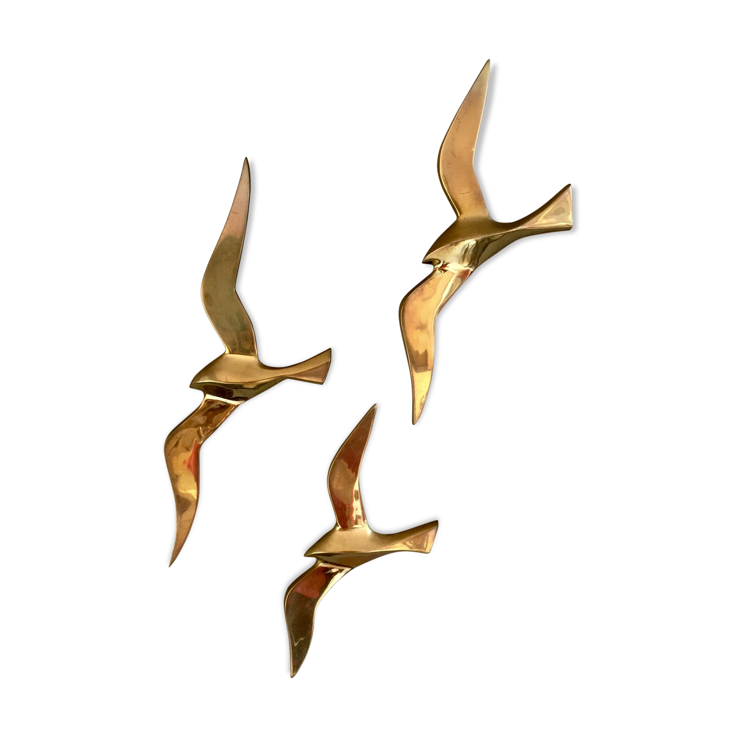 Trio of brass birds