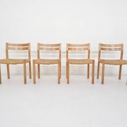 Set of four oak and sisal dining chairs model 401 by JL Moller, Denmark 1970's