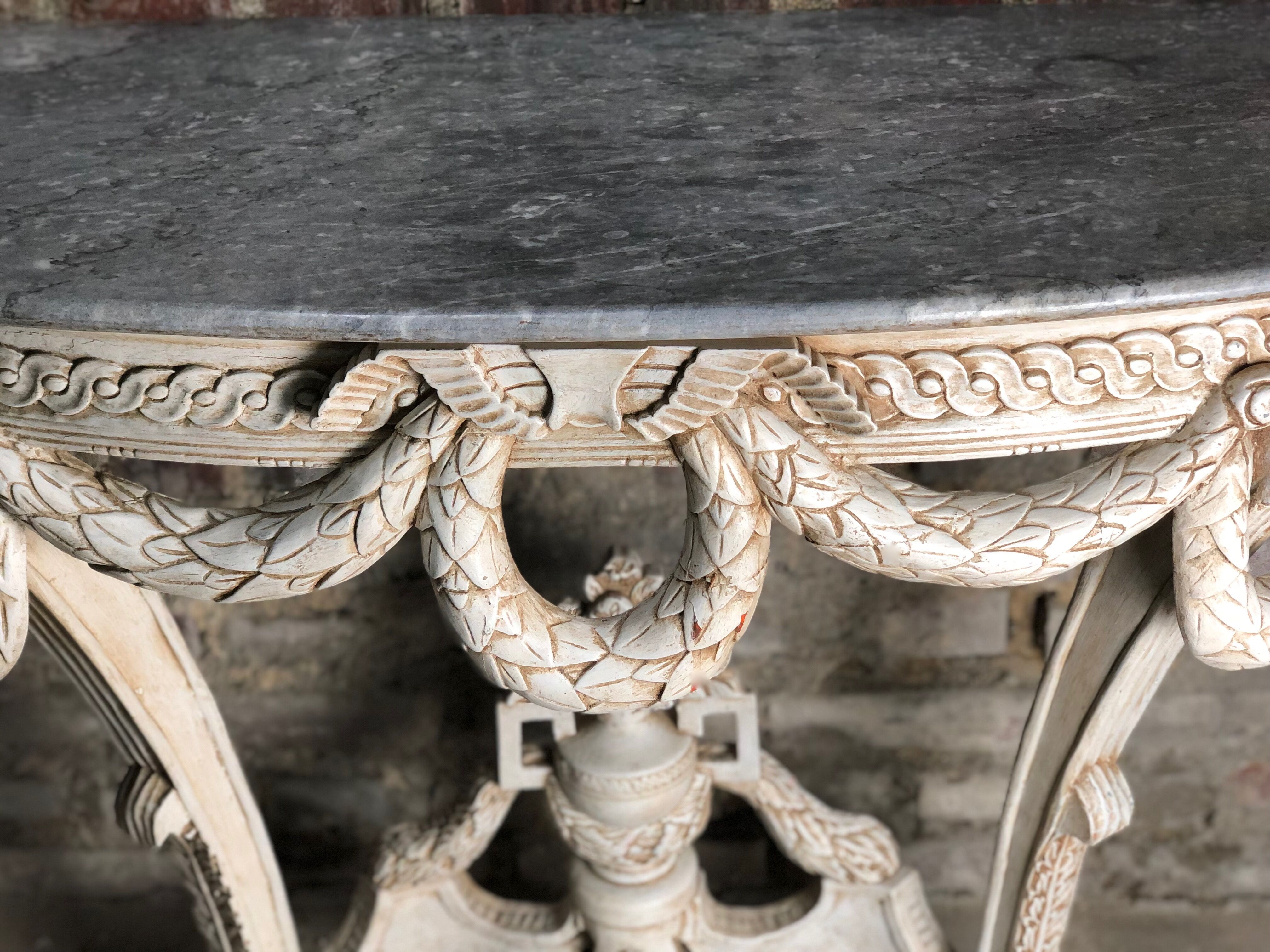 Louis XVI style console in carved wood beige patinated above gray marble