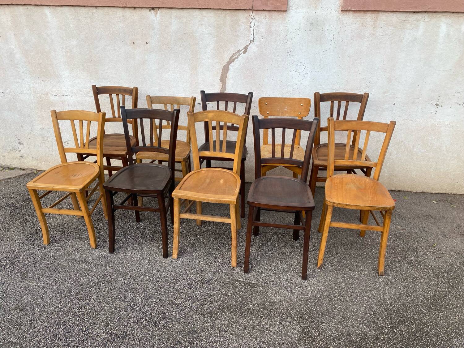 Set of 10 mismatched bistro chairs