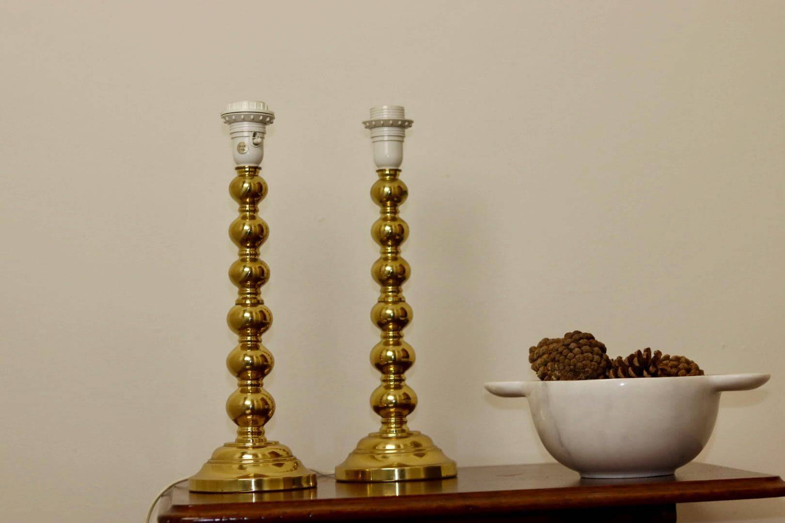 Pair of Swedish brass lamps from the mid-century.