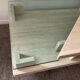 Table basse vintage en travertin et verre