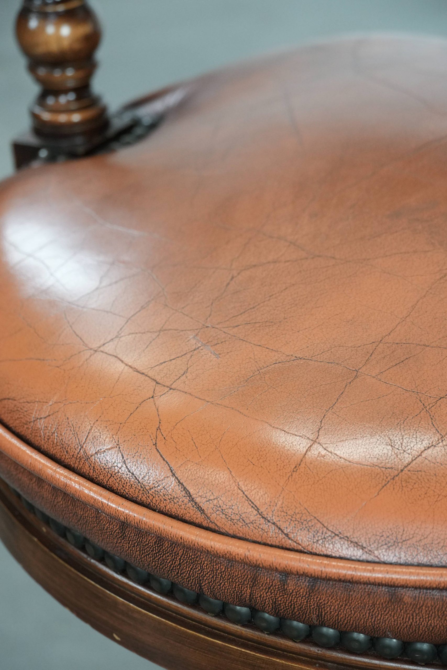 Classic and timeless cow leather and wooden Chesterfield office chair