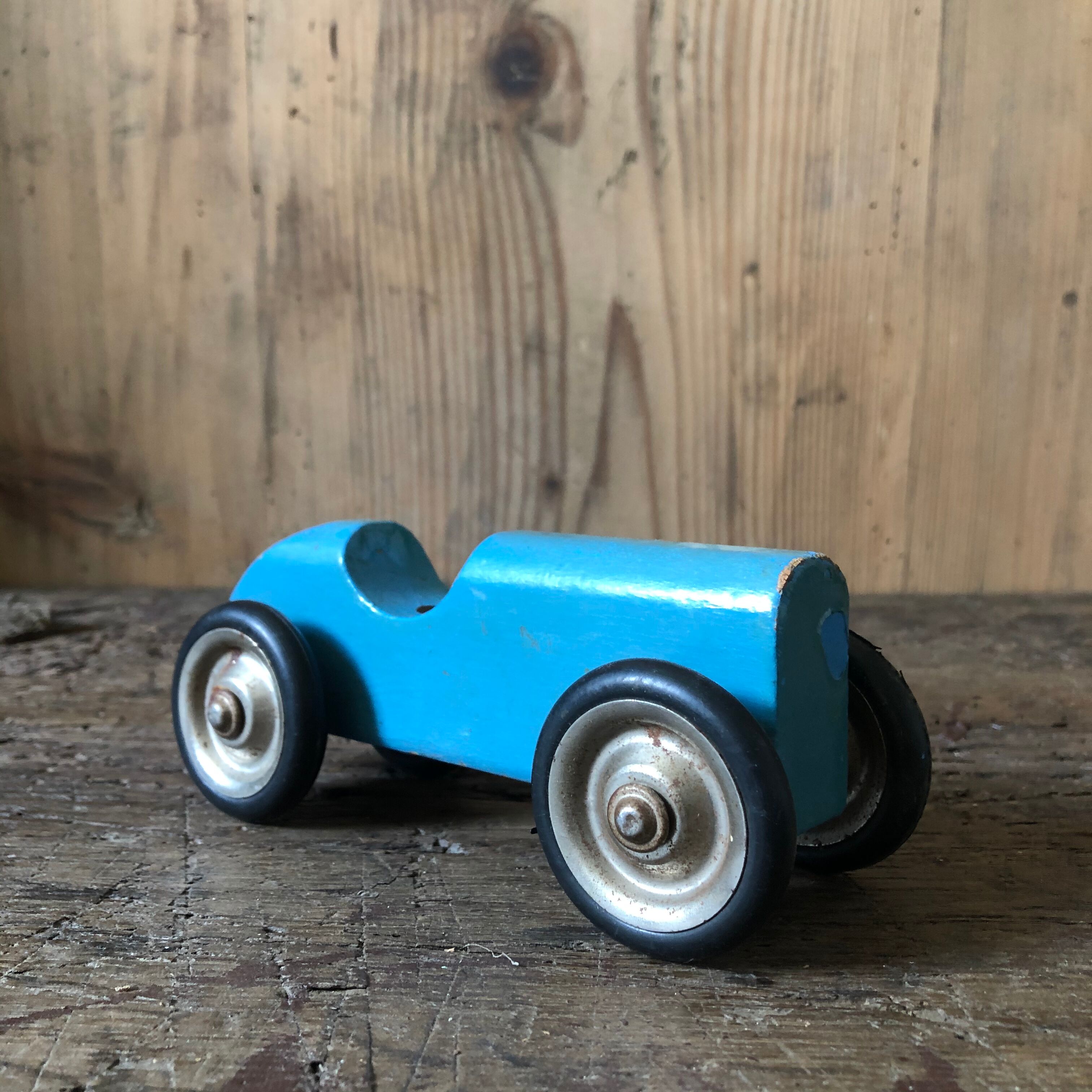 Old painted wooden toy car